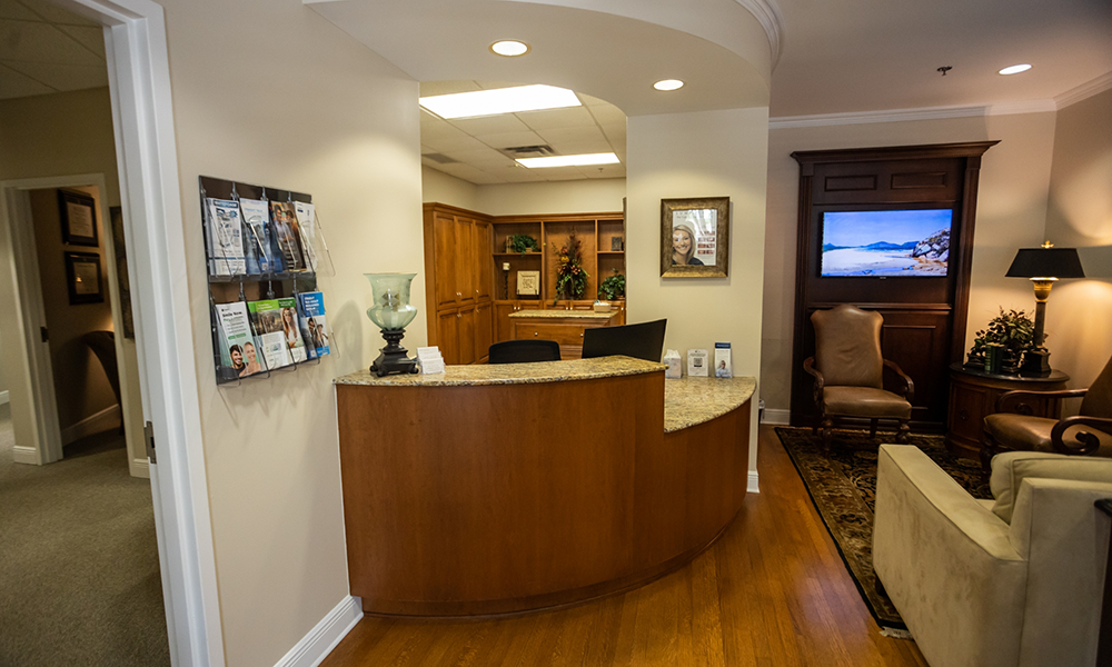 Antique brown chairs in reception area