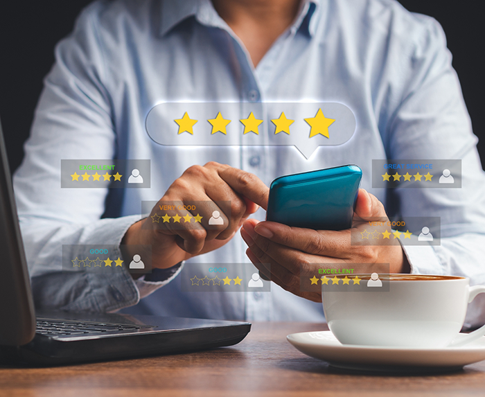 Person looking at multiple reviews on their phone